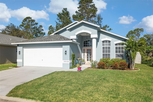 single story home with stucco siding, french doors, a front yard, concrete driveway, and an attached garage