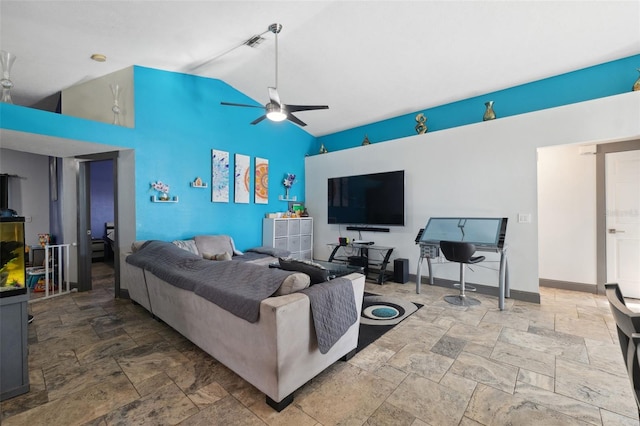 living room featuring visible vents, a ceiling fan, stone tile flooring, and high vaulted ceiling