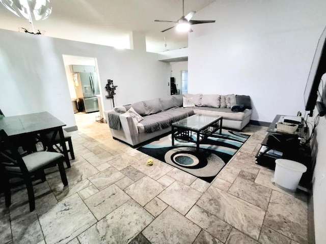 7940 Fashion Loop, New Port Richey, FL 34654 - living area featuring a ceiling fan and stone tile flooring