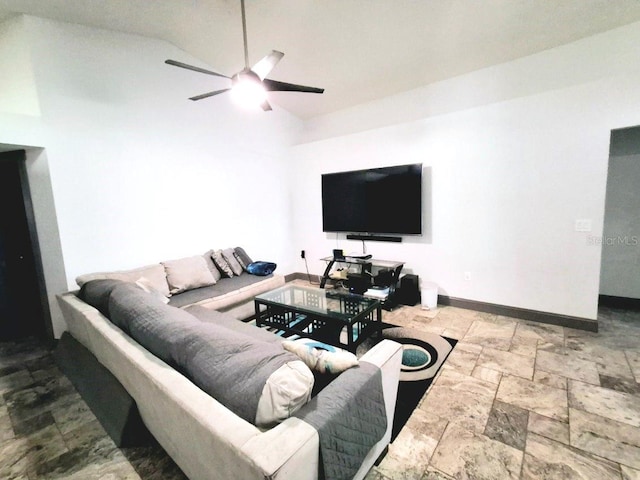 7940 Fashion Loop, New Port Richey, FL 34654 - living area featuring a ceiling fan, stone tile floors, and high vaulted ceiling