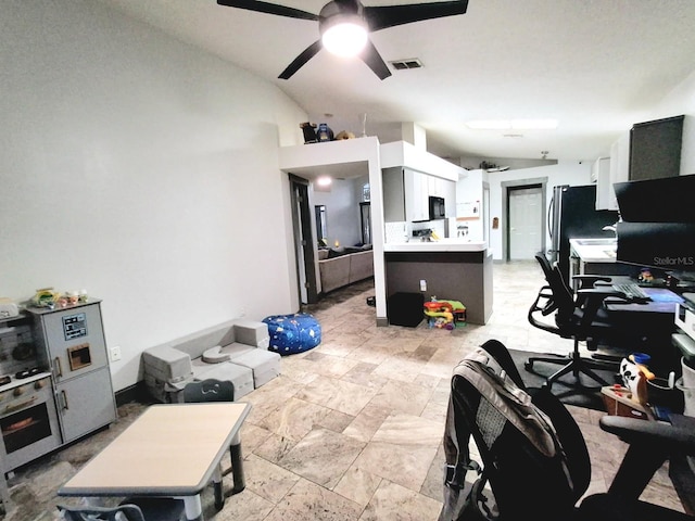 7940 Fashion Loop, New Port Richey, FL 34654 - kitchen featuring freestanding refrigerator, vaulted ceiling, ceiling fan, light countertops, and an office area