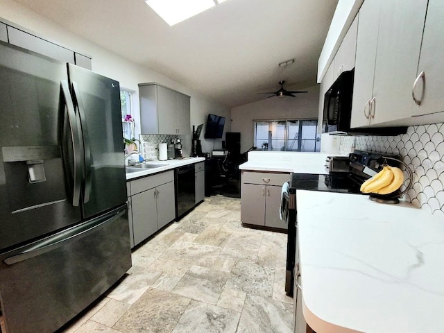 7940 Fashion Loop, New Port Richey, FL 34654 - kitchen featuring black appliances, gray cabinetry, backsplash, lofted ceiling, and ceiling fan