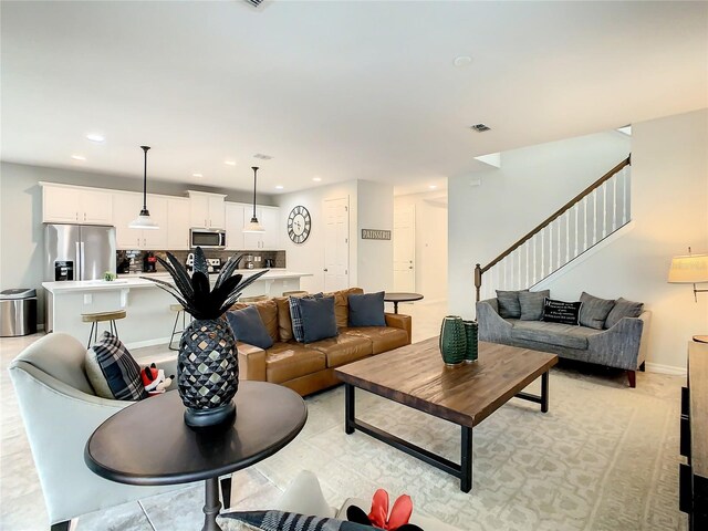 1861 Sawyer Palm Pl, Kissimmee, FL 34747 - living area featuring stairs and recessed lighting
