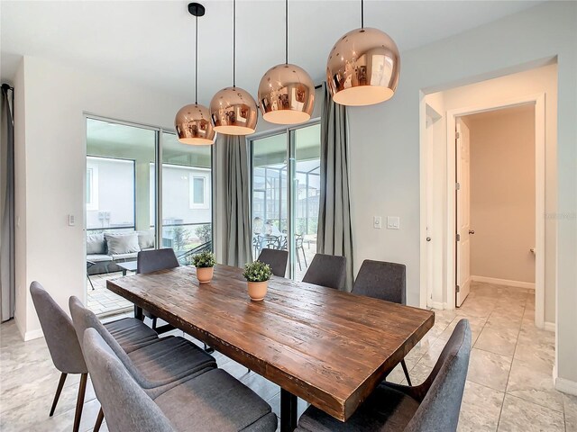 1861 Sawyer Palm Pl, Kissimmee, FL 34747 - dining room featuring healthy amount of natural light and baseboards