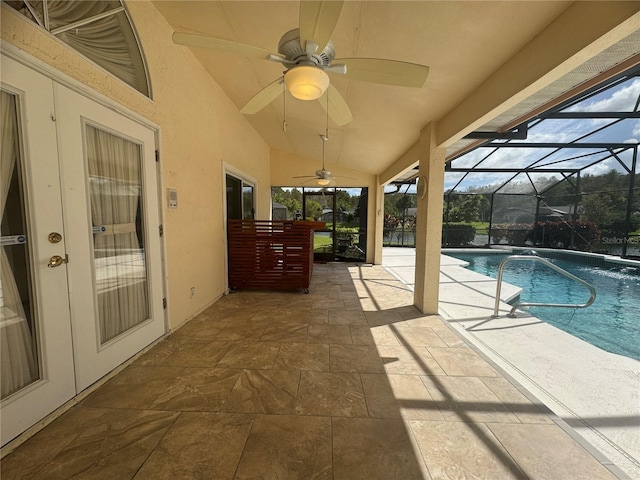 view of pool with a patio, a lanai, and ceiling fan