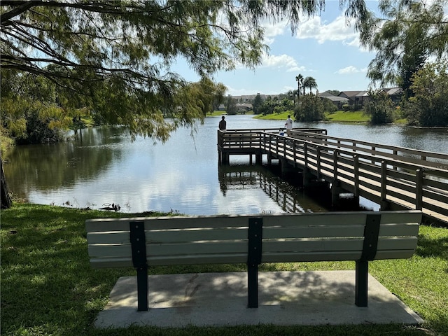 dock area featuring a water view