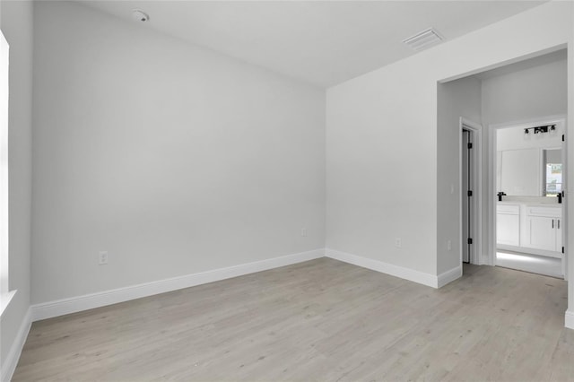 empty room featuring light hardwood / wood-style floors