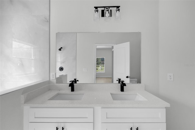 bathroom featuring vanity and walk in shower