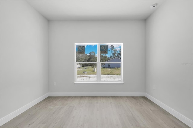 empty room featuring light hardwood / wood-style floors