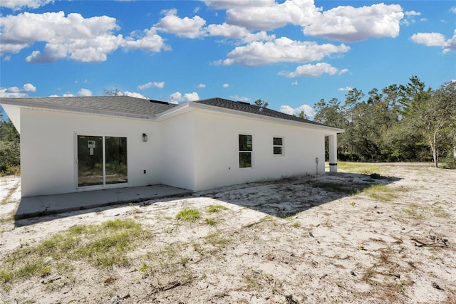 back of house featuring a patio