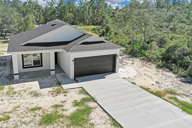 view of front of home with a garage