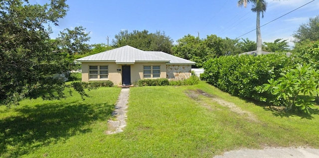 view of front of home with a front yard