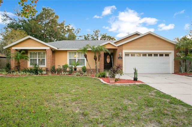 ranch-style home featuring a garage and a front yard