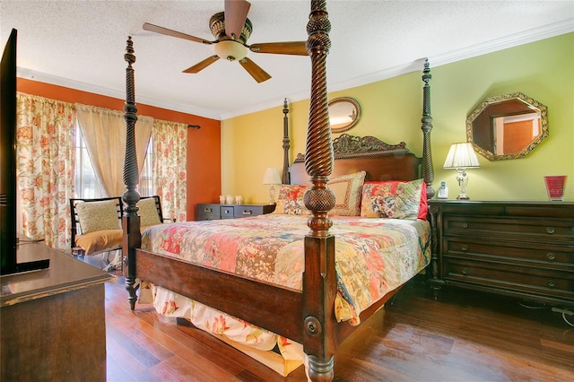 bedroom with ceiling fan, wood-type flooring, a textured ceiling, and ornamental molding