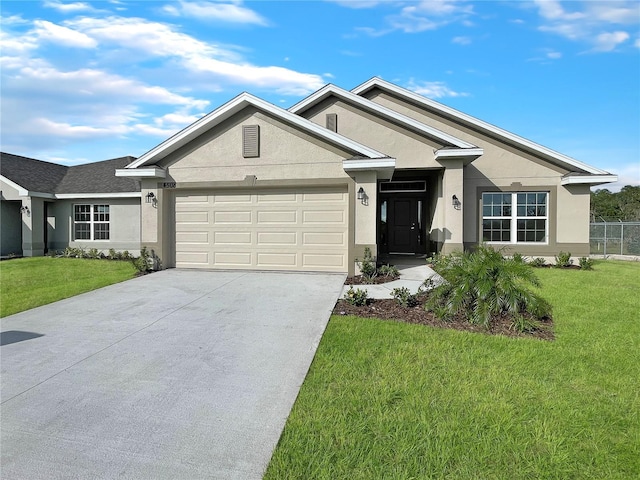 4394 Sagefield Dr, Harmony, FL 34773 - ranch-style house featuring stucco siding, a garage, and driveway
