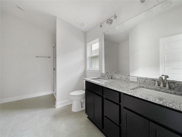 4394 Sagefield Dr, Harmony, FL 34773 - bathroom featuring toilet, double vanity, tile patterned floors, a shower with door, and baseboards
