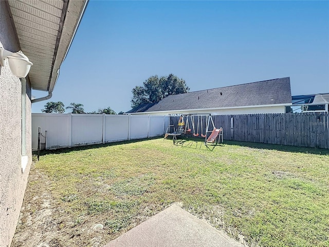 view of yard featuring a playground