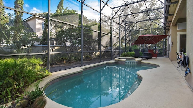 view of pool with an in ground hot tub and a lanai