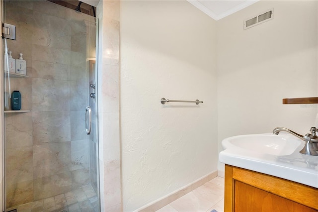 bathroom with crown molding, tile patterned flooring, vanity, and walk in shower