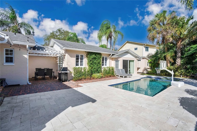 rear view of house featuring a patio area