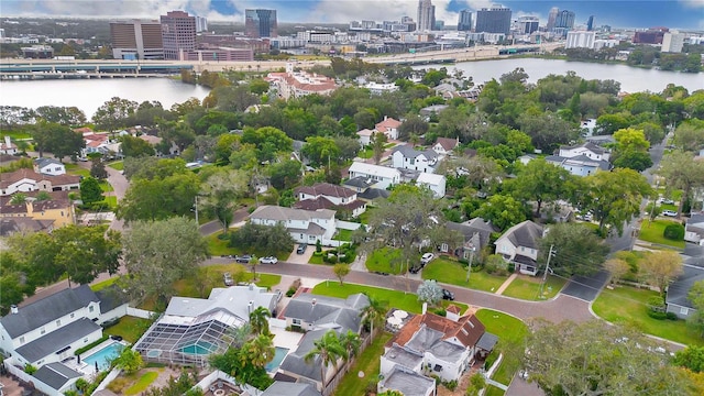 birds eye view of property featuring a water view