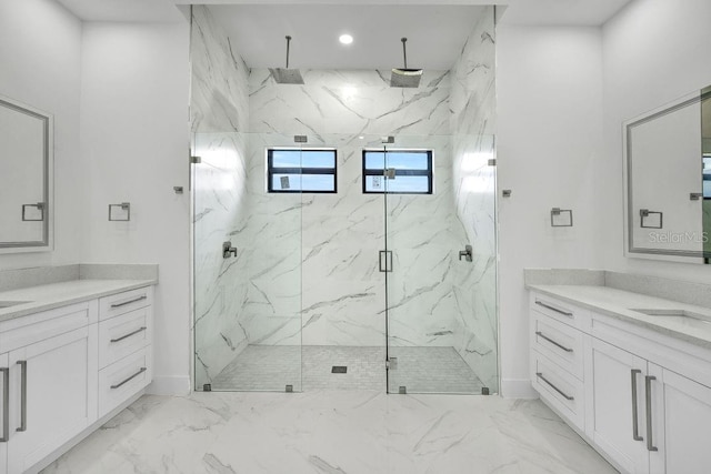 bathroom with vanity and a shower with shower door