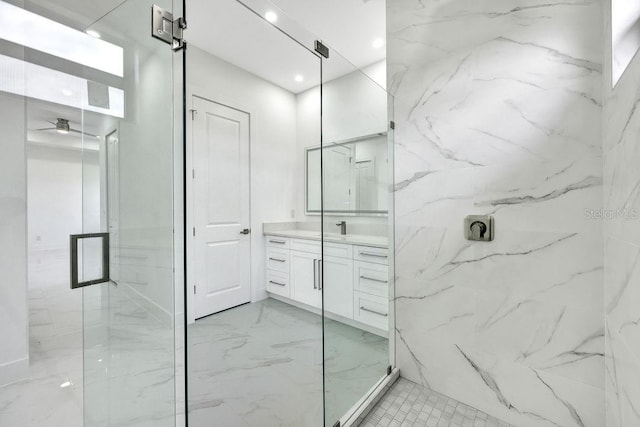 bathroom with vanity and an enclosed shower