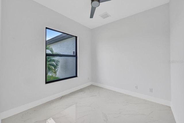 unfurnished room with ceiling fan