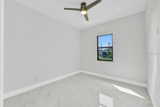 spare room with ceiling fan