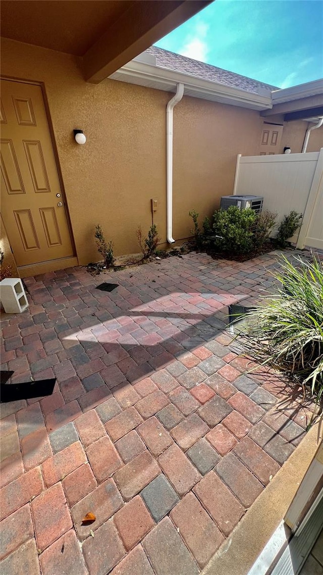 view of patio / terrace with central AC unit