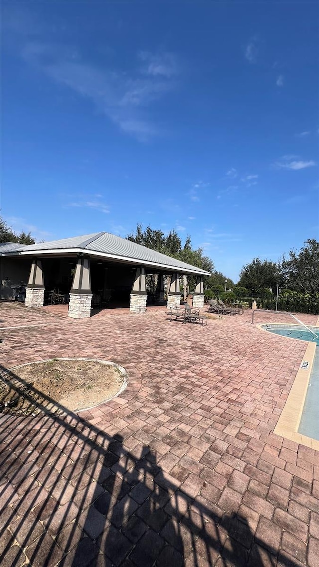 back of house featuring a patio area