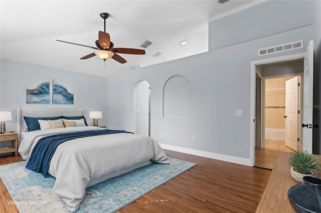 bedroom with wood-type flooring and ceiling fan