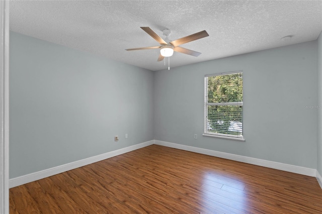 empty room with hardwood / wood-style floors, a textured ceiling, and ceiling fan