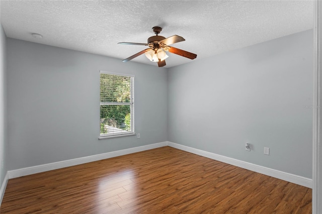 unfurnished room with a textured ceiling, hardwood / wood-style flooring, and ceiling fan