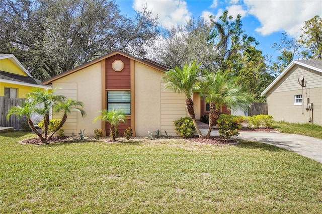 view of front of home with a front yard