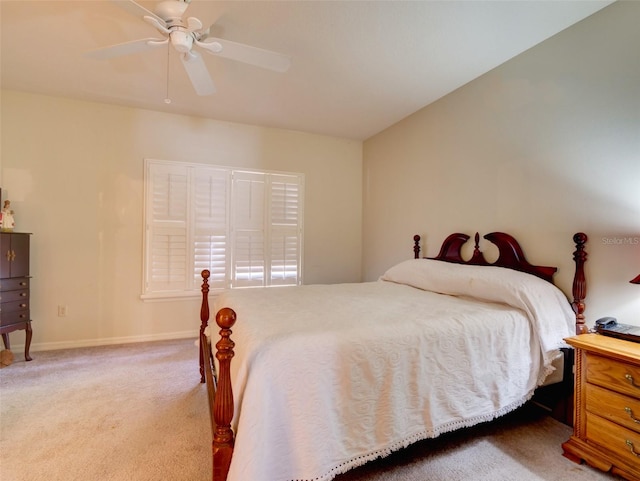 bedroom featuring carpet, ceiling fan, and baseboards