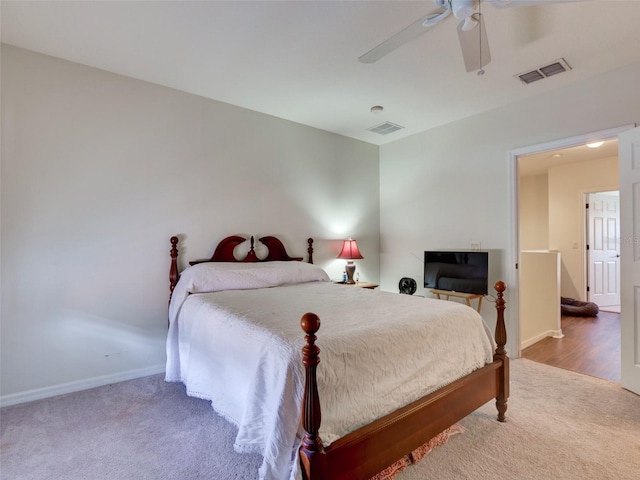 bedroom with ceiling fan, carpet, and visible vents