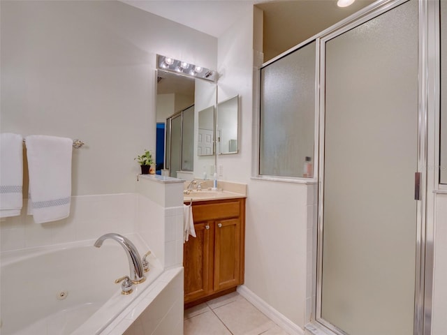 535 Crimson Ln, Winter Springs, FL 32708 - full bathroom with a stall shower, a jetted tub, vanity, and tile patterned flooring