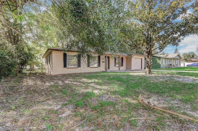 view of front of home with a front yard