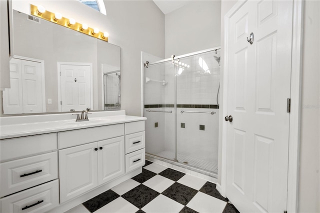 bathroom with vanity and walk in shower