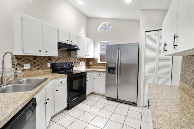 kitchen featuring under cabinet range hood, black appliances, light countertops, and a sink