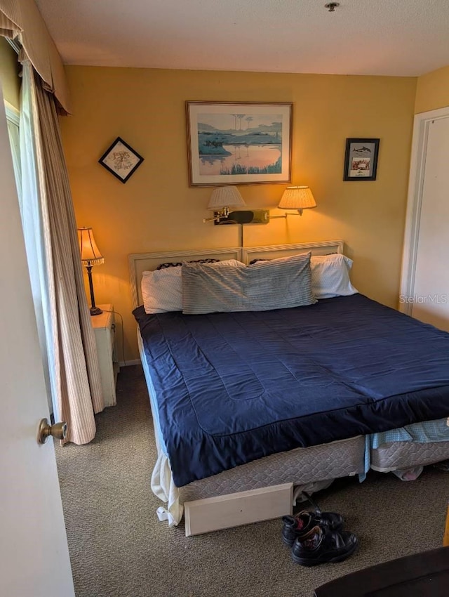 bedroom featuring carpet flooring