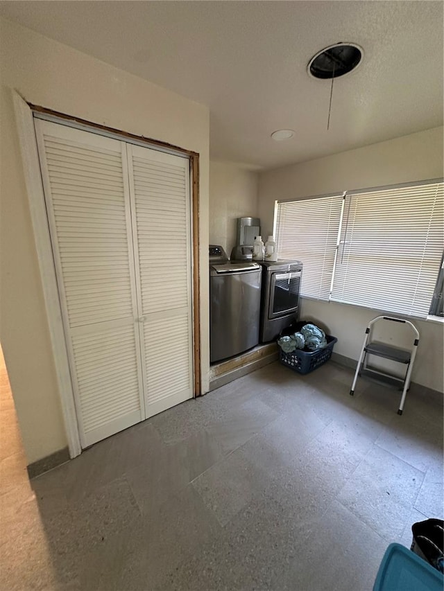 washroom featuring independent washer and dryer