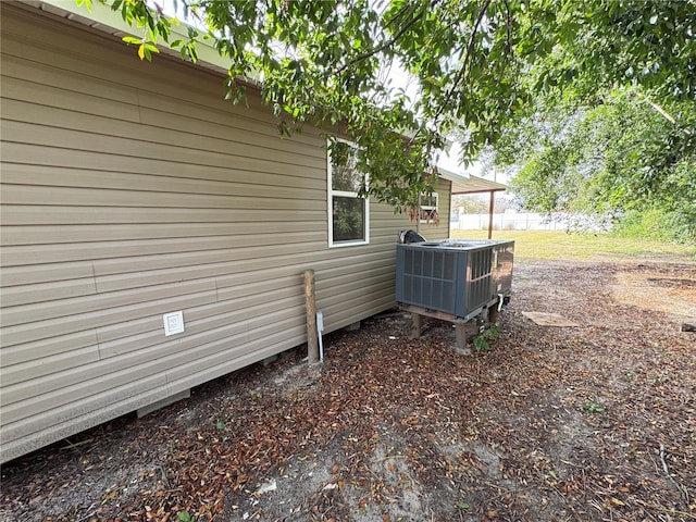 view of home's exterior with central AC unit