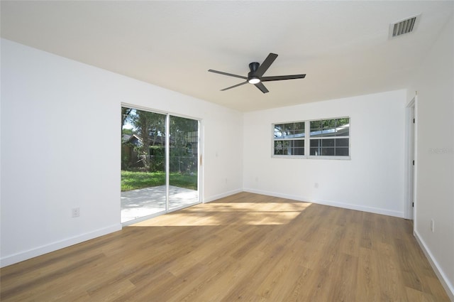 unfurnished room featuring light hardwood / wood-style flooring and ceiling fan