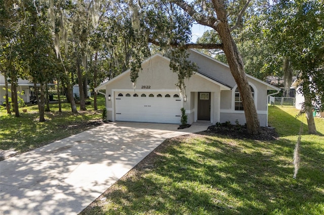 single story home featuring a garage and a front lawn