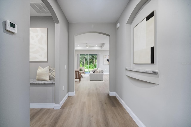 corridor featuring light hardwood / wood-style flooring