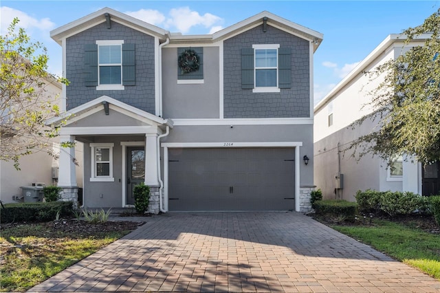 view of front of property featuring a garage