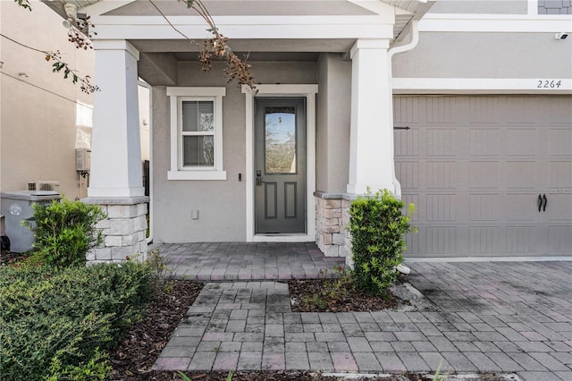 property entrance with a garage