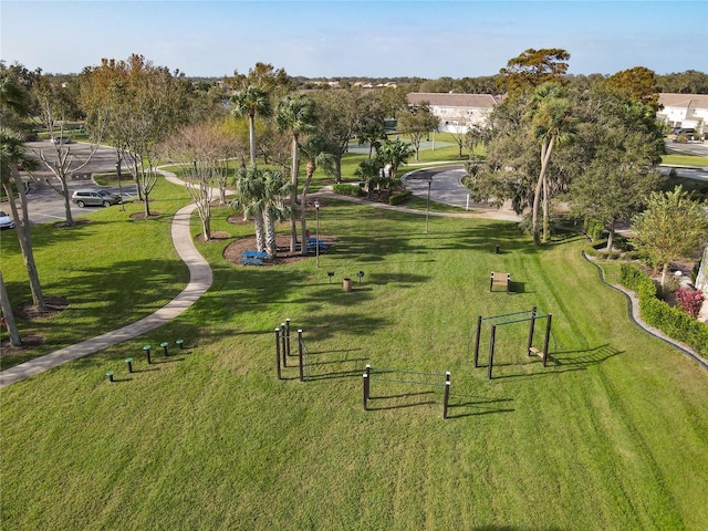 view of home's community featuring a lawn